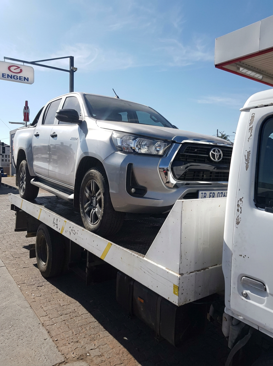 Toyota Hilux loaded on Juels Towing flatbed